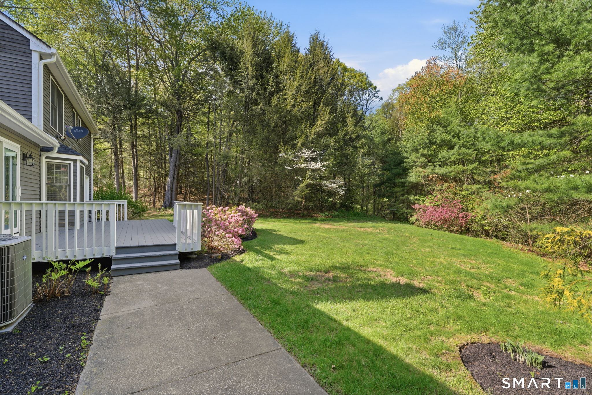 21 Greenwood Road North Granby, CT 06060 - Photo 31 of 40 a view of a house with backyard and sitting area