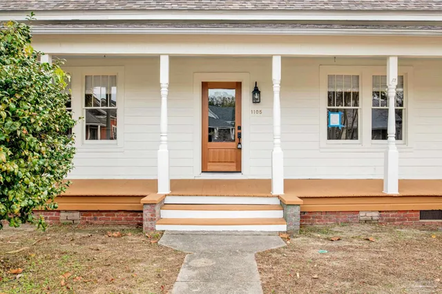 a small garden in the corners of a house
