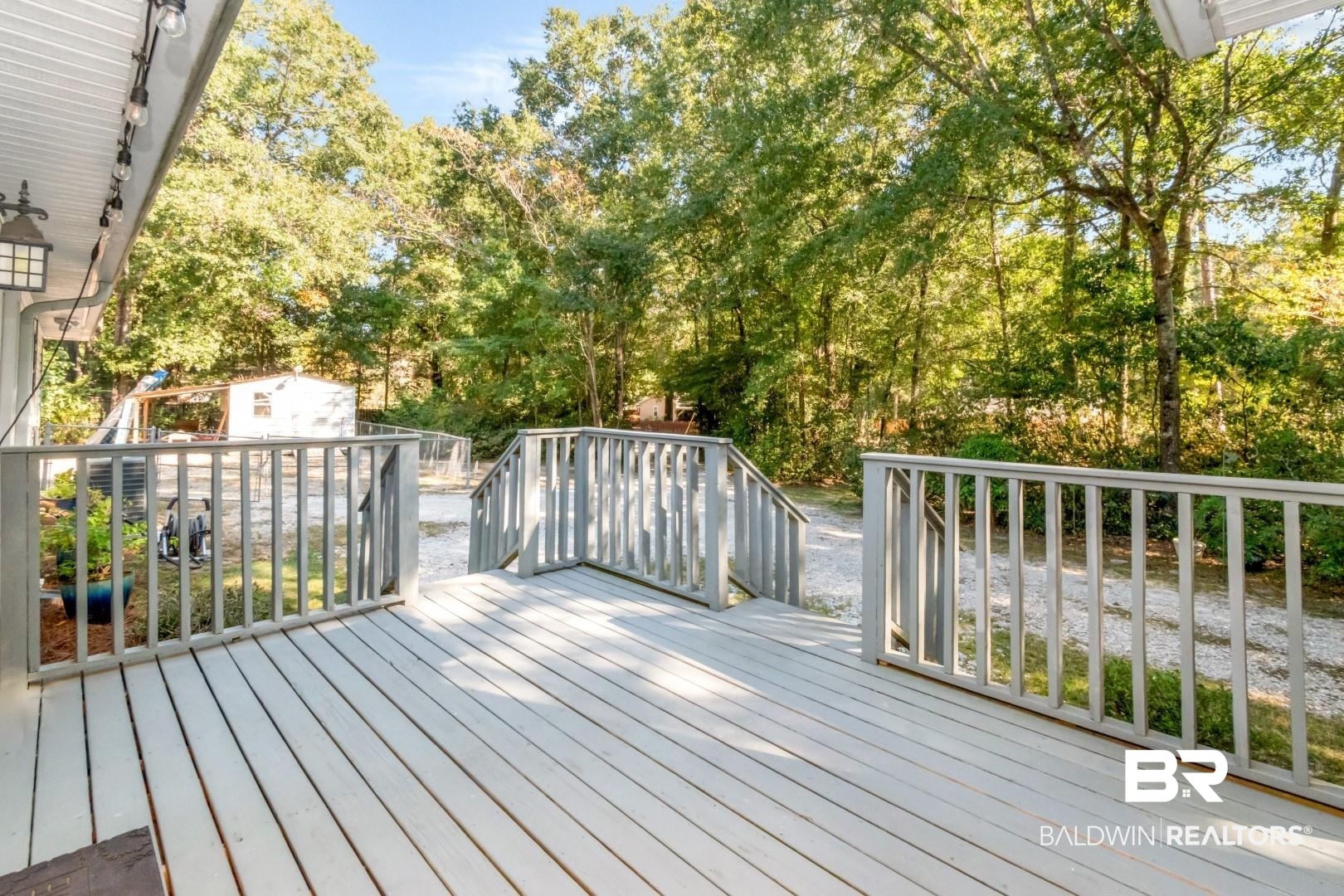 1321 Rainbow Drive West Mobile, AL 36693 - Photo 36 of 48 Wooden terrace with a storage unit