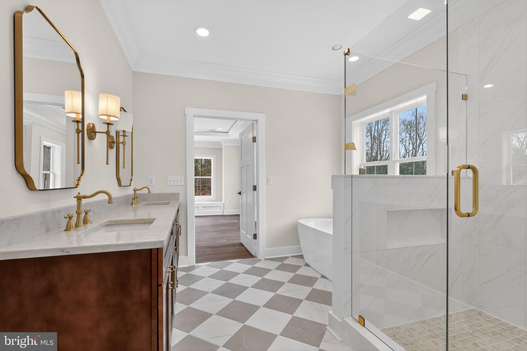 27458 Mooring Way Salisbury, MD 21801 - Photo 17 of 32 a spacious bathroom with a sink a toilet and shower