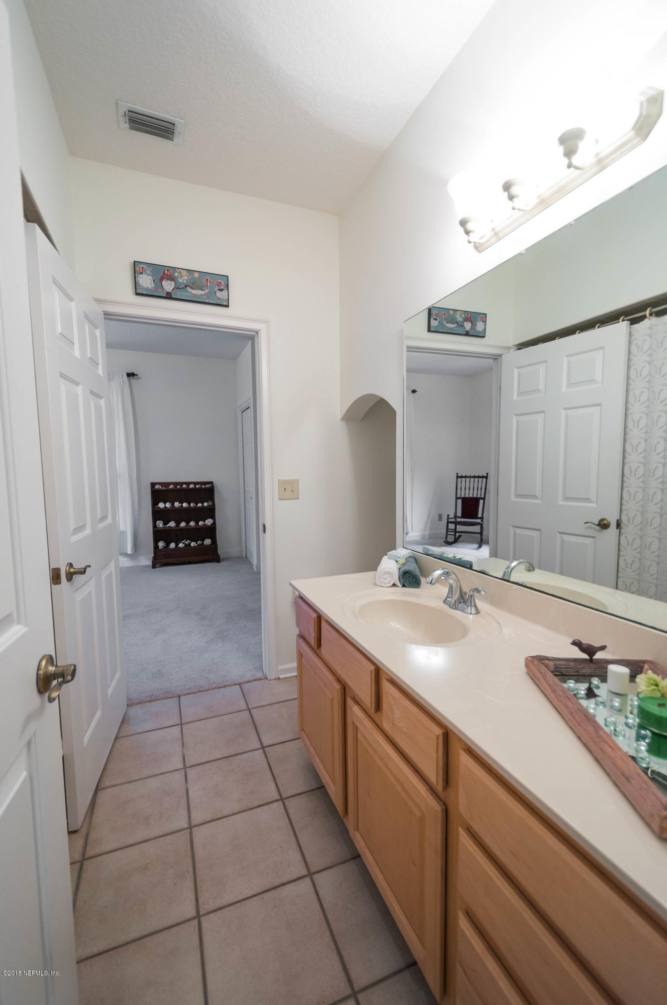 1341 Roberts Road St. Johns, FL 32259 - Photo 12 of 36 a spacious bathroom with a sink a mirror and a shower