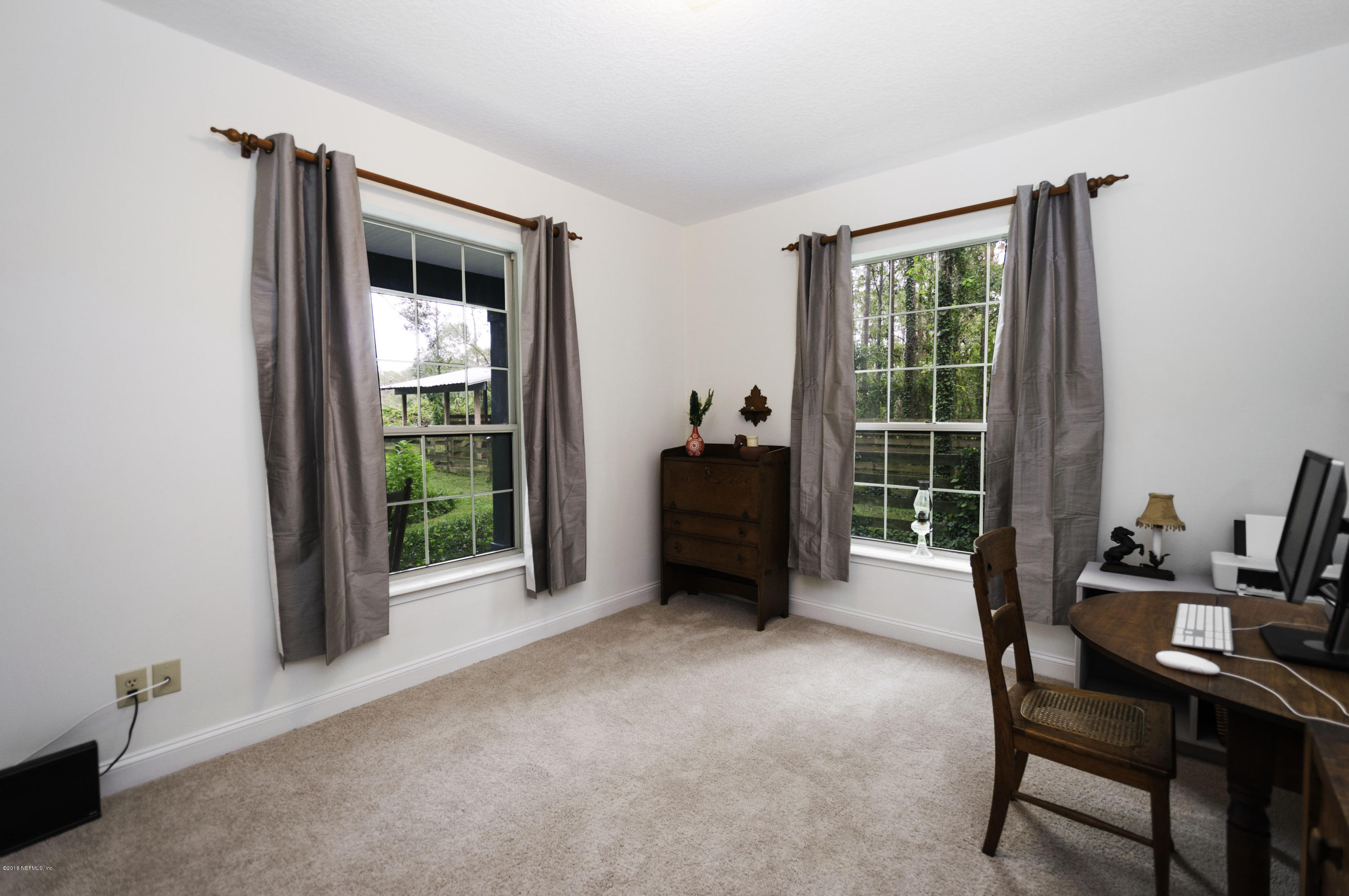 1341 Roberts Road St. Johns, FL 32259 - Photo 14 of 36 a living room with furniture and a window