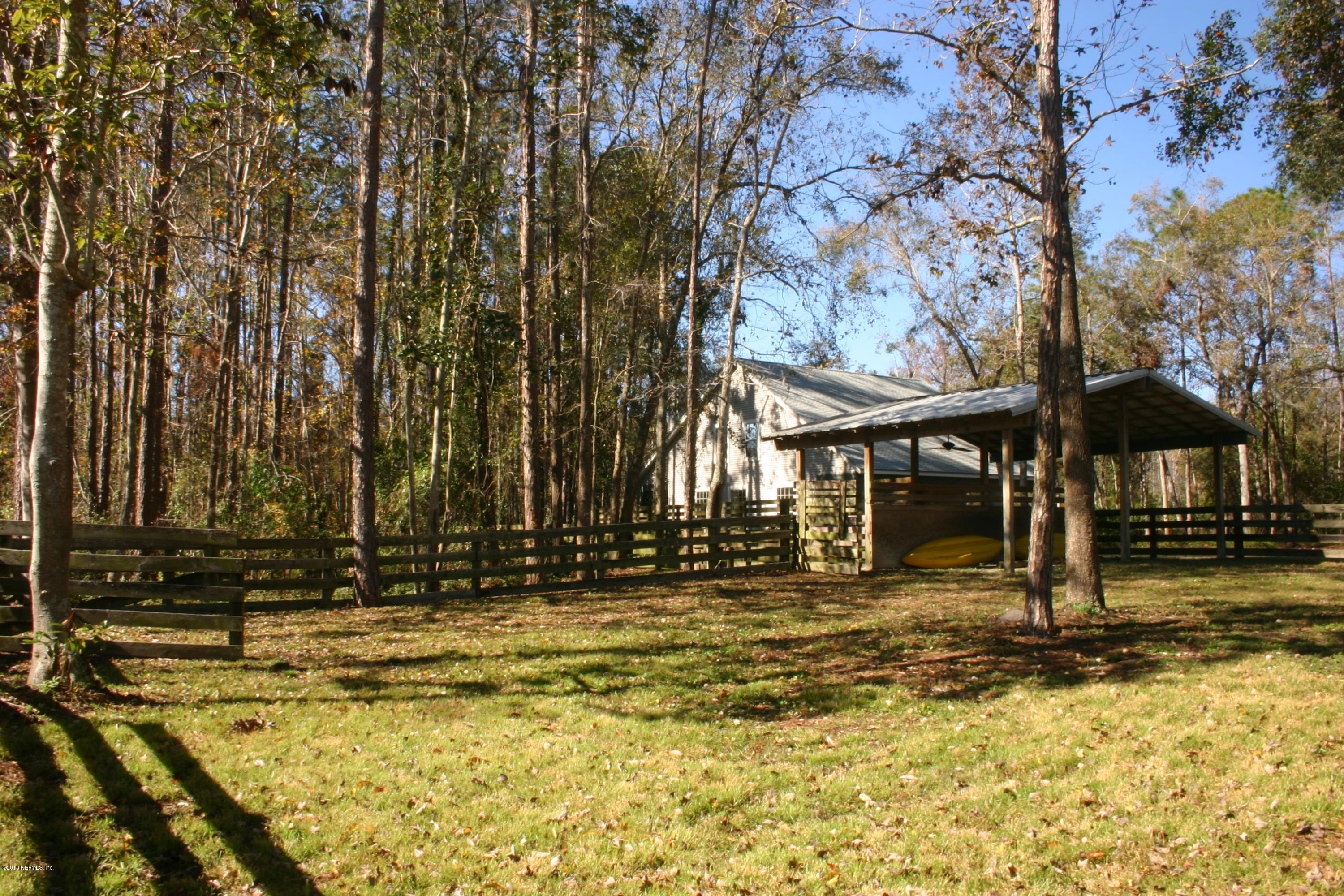 1341 Roberts Road St. Johns, FL 32259 - Photo 32 of 36 a backyard of a house with lots of green space