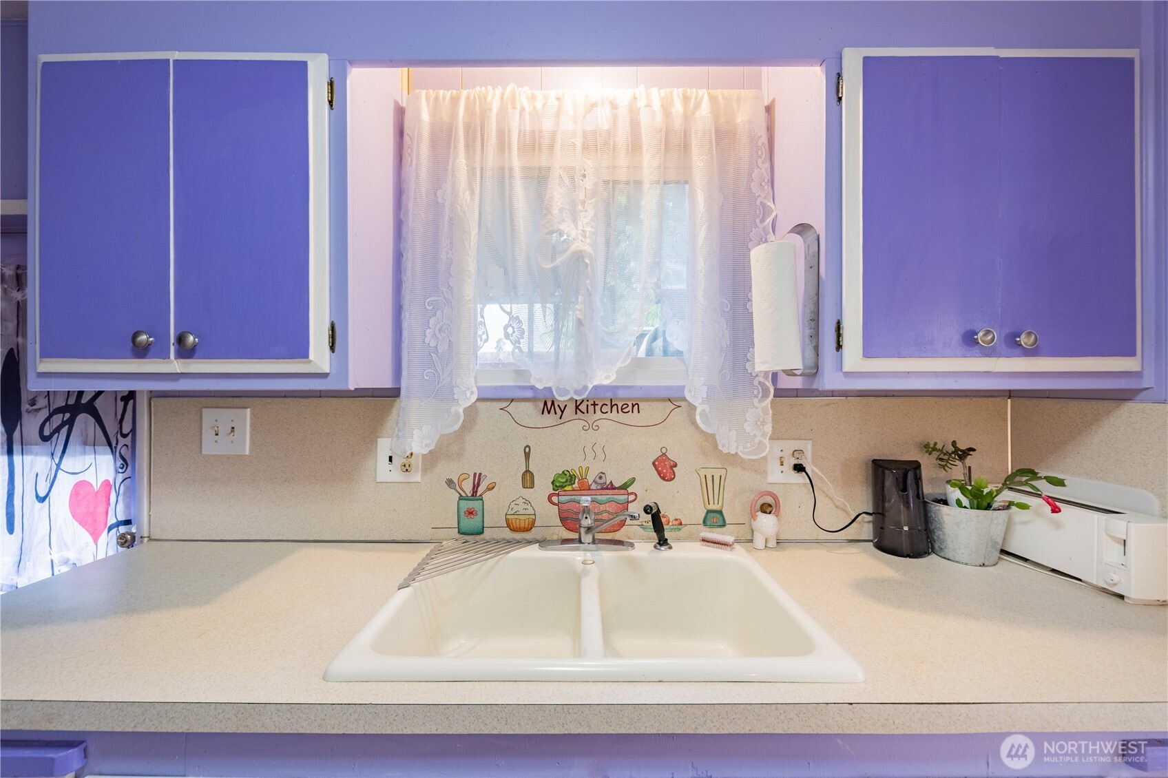 930 Trosper Road Southwest, Unit 64 Tumwater, WA 98512 - Photo 11 of 26 a bathroom with a sink and a mirror
