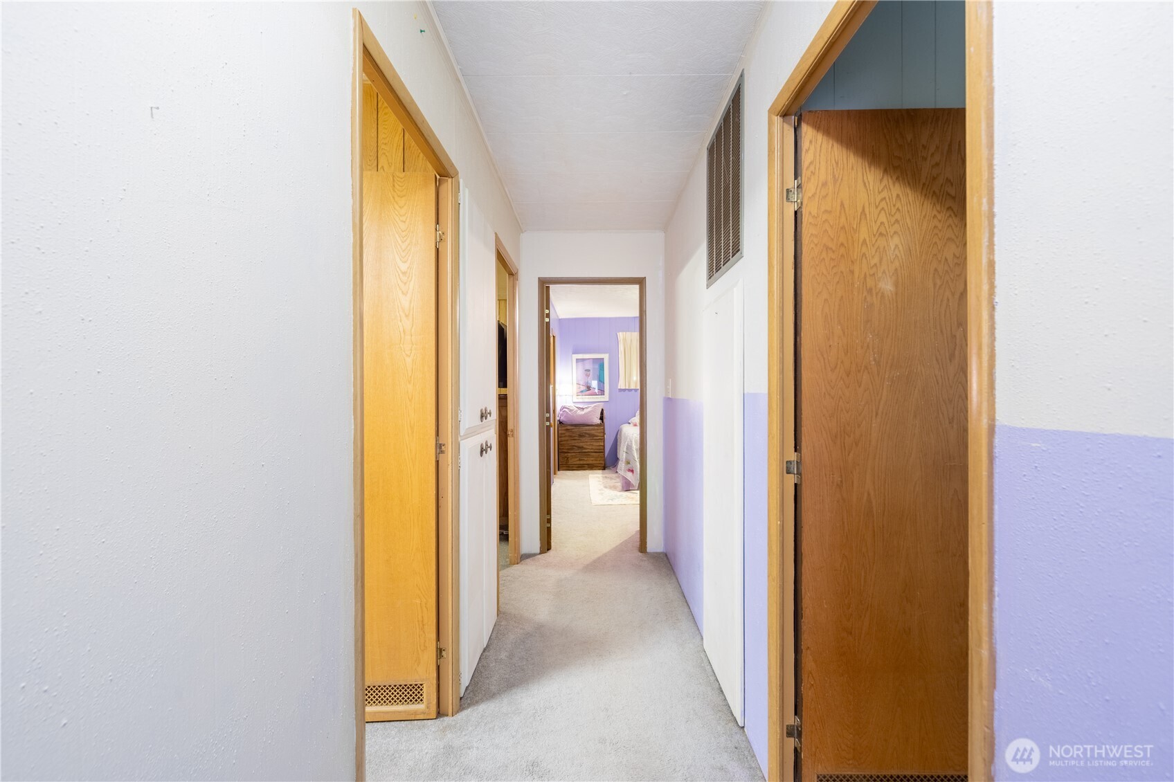 930 Trosper Road Southwest, Unit 64 Tumwater, WA 98512 - Photo 12 of 26 a view of a bathroom from a hallway