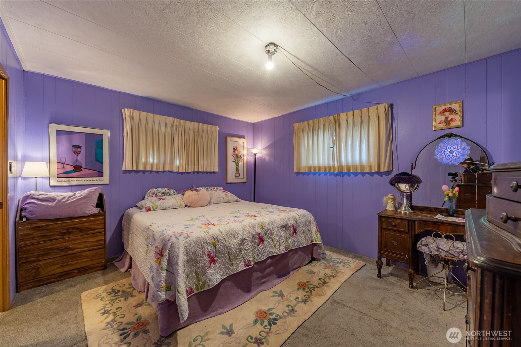 930 Trosper Road Southwest, Unit 64 Tumwater, WA 98512 - Photo 13 of 26 a bedroom with a bed and a dresser