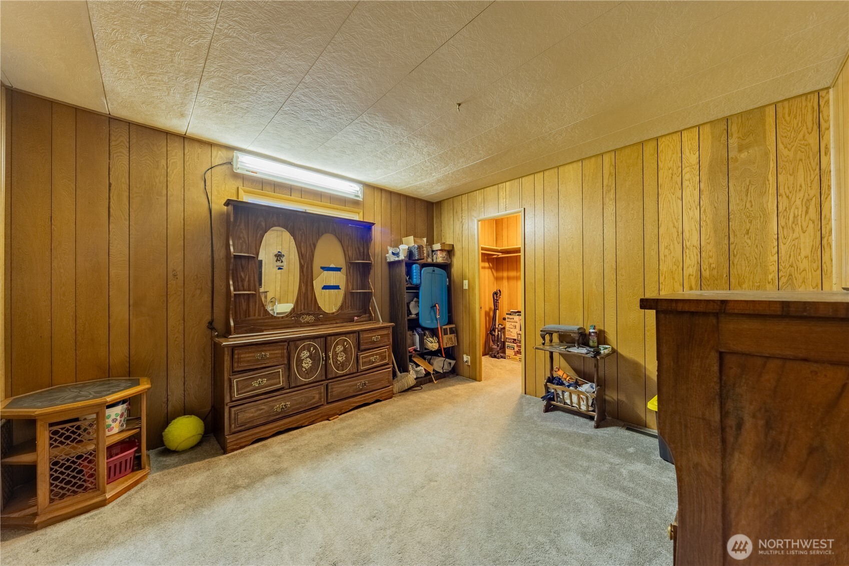 930 Trosper Road Southwest, Unit 64 Tumwater, WA 98512 - Photo 18 of 26 a view of room with furniture and a window
