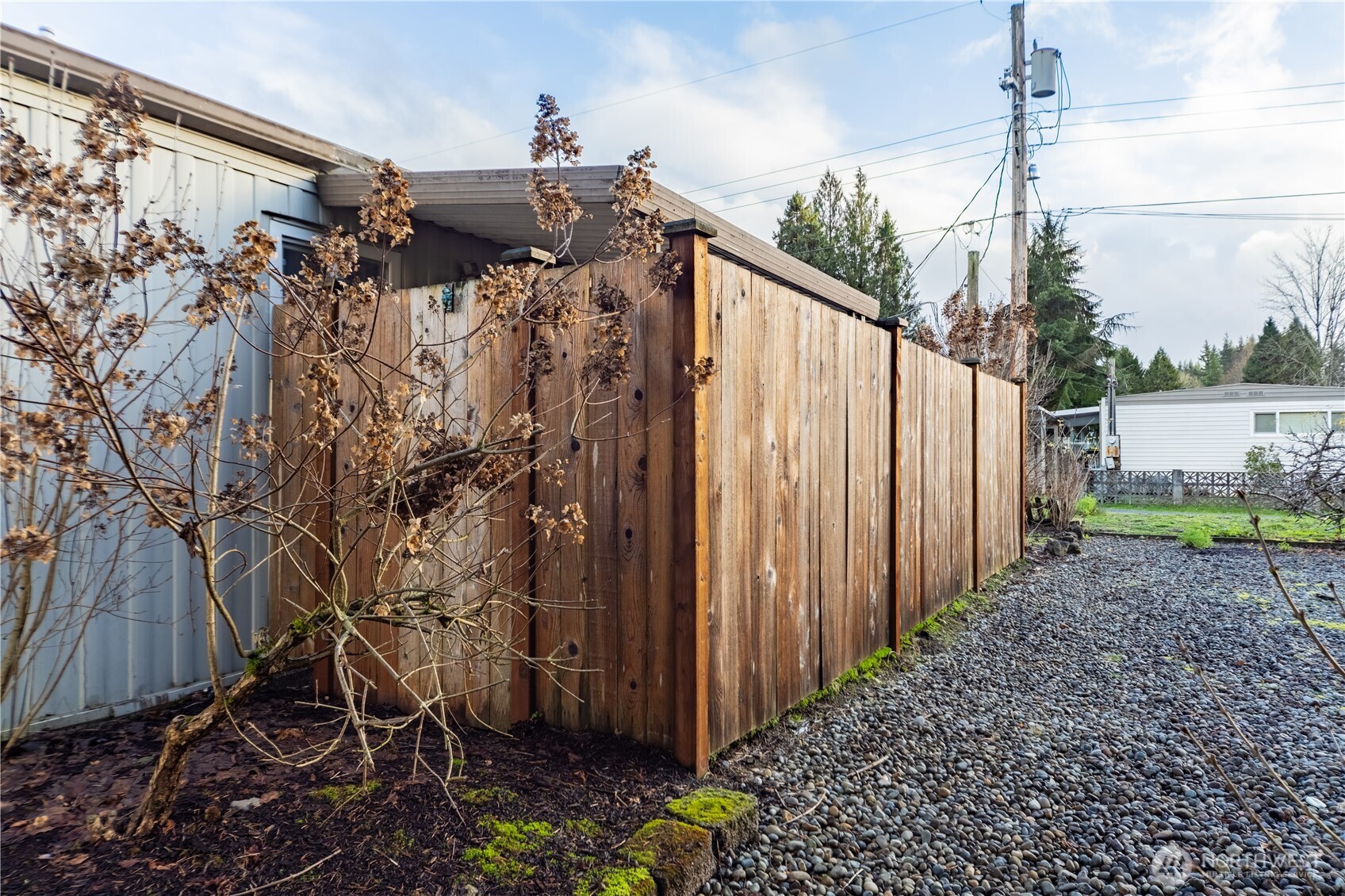 930 Trosper Road Southwest, Unit 64 Tumwater, WA 98512 - Photo 22 of 26 a view of a pathway of a house