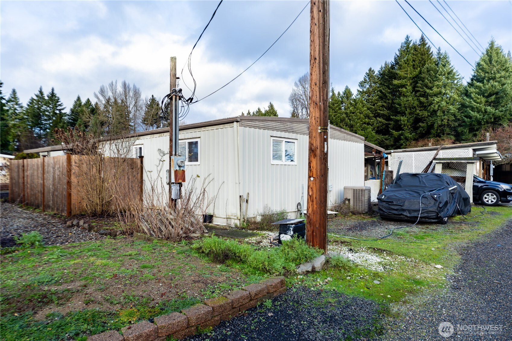 930 Trosper Road Southwest, Unit 64 Tumwater, WA 98512 - Photo 23 of 26 a view of a back yard of the house