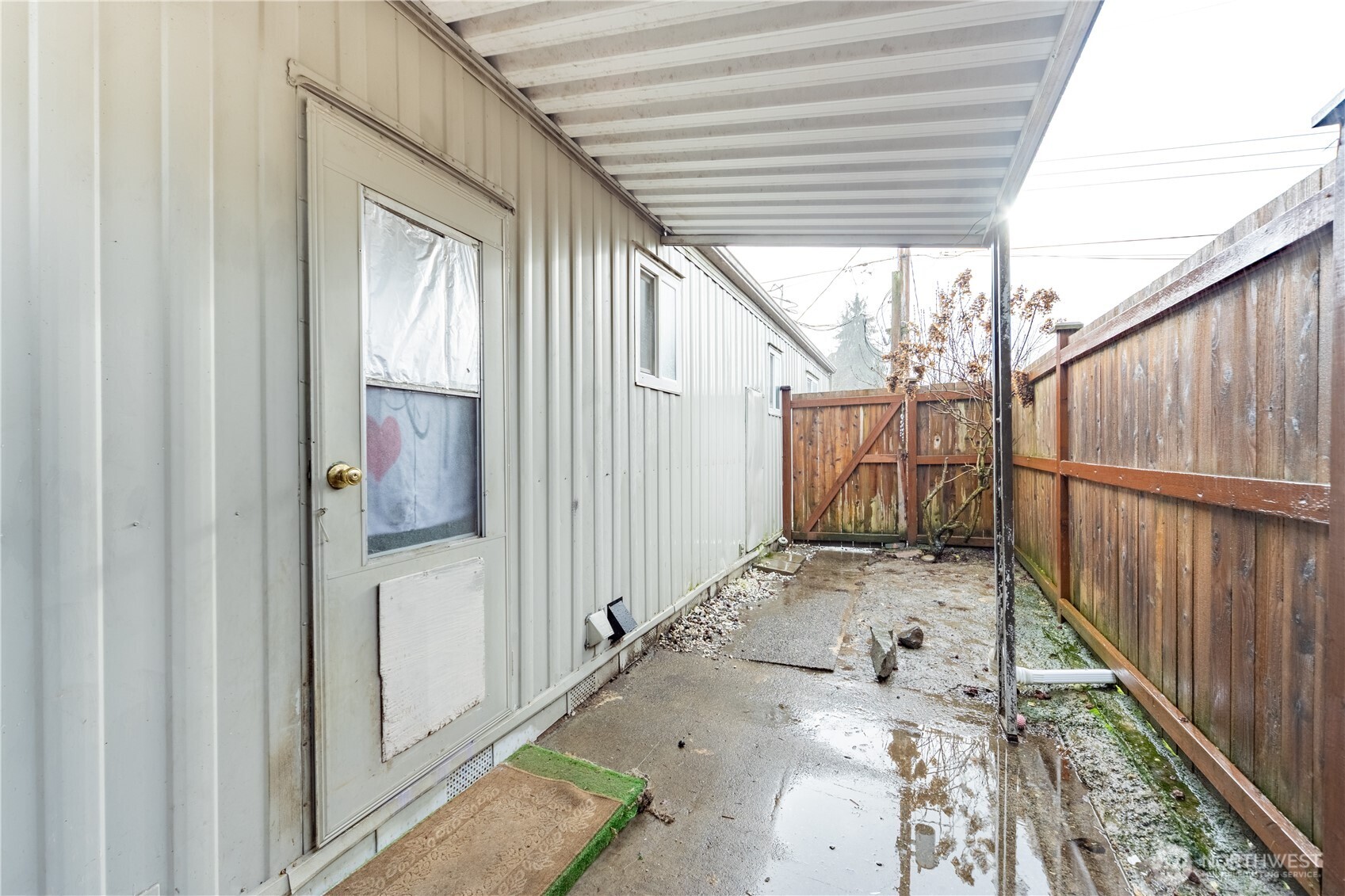 930 Trosper Road Southwest, Unit 64 Tumwater, WA 98512 - Photo 25 of 26 a backyard of a house