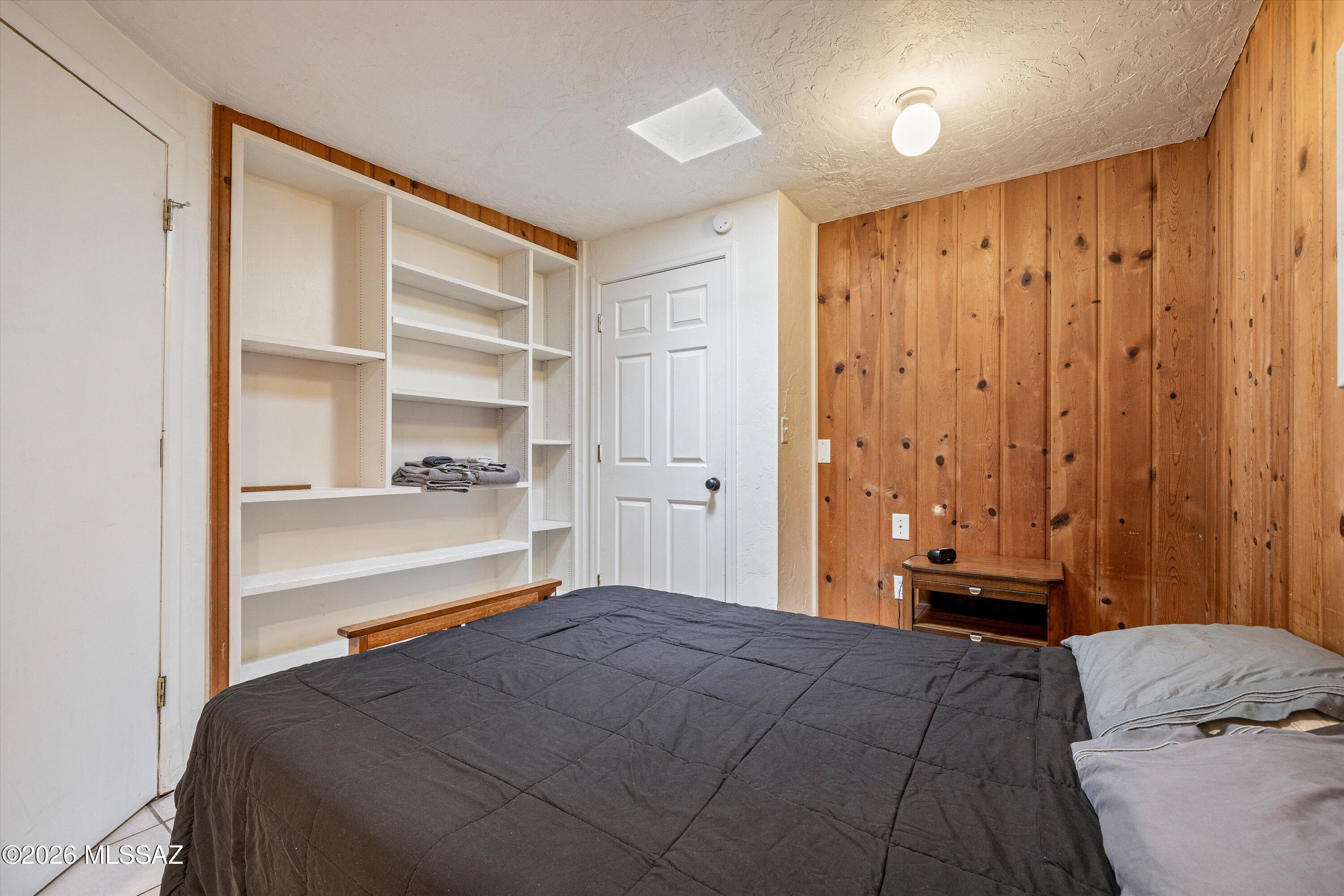 2619 East Prince Road Tucson, AZ 85716 - Photo 25 of 50 a bedroom with a bed and a window