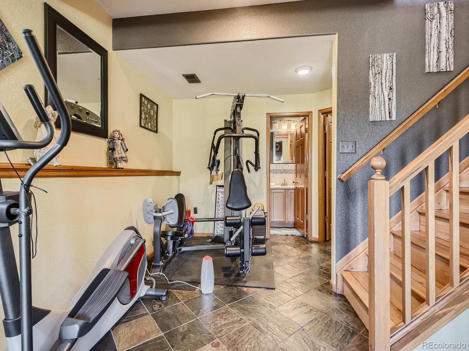 7051 Ski Trail Evergreen, CO 80439 - Photo 19 of 39 a view of a hallway with seating area