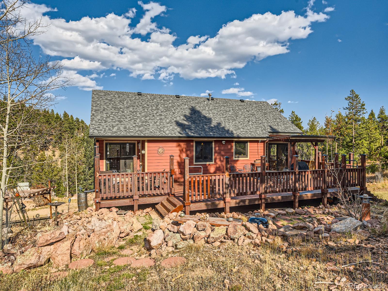 7051 Ski Trail Evergreen, CO 80439 - Photo 26 of 39 a front view of a house
