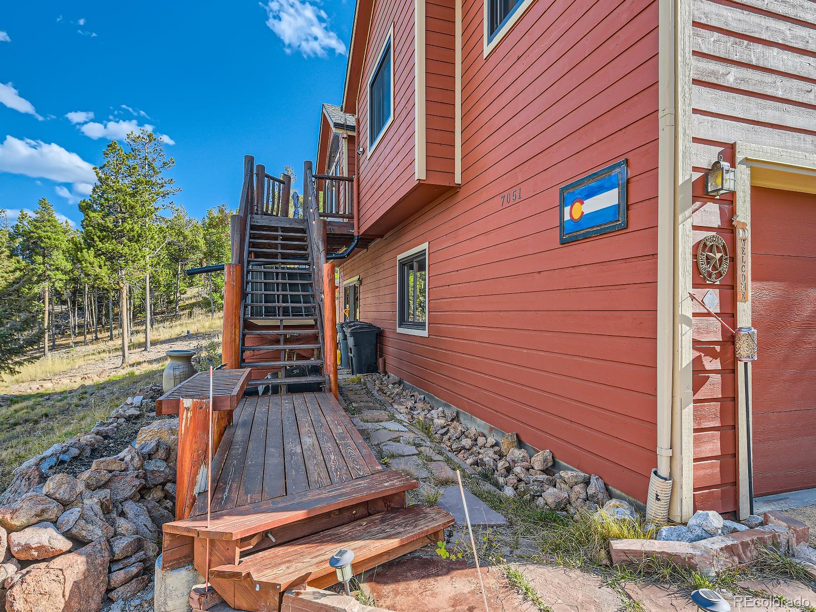 7051 Ski Trail Evergreen, CO 80439 - Photo 27 of 39 a view of backyard with wooden fence