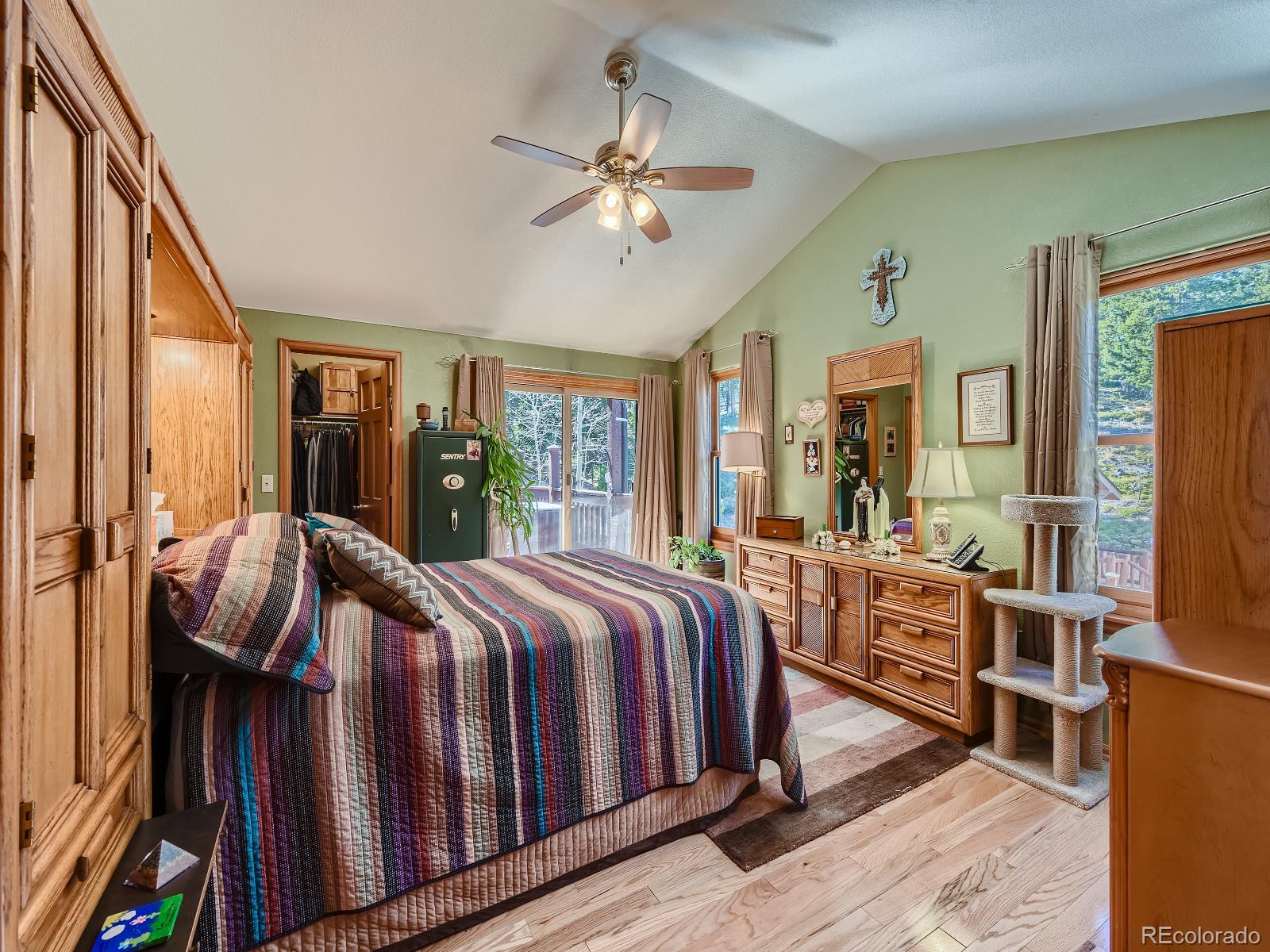 7051 Ski Trail Evergreen, CO 80439 - Photo 7 of 39 a bed room with bed and window
