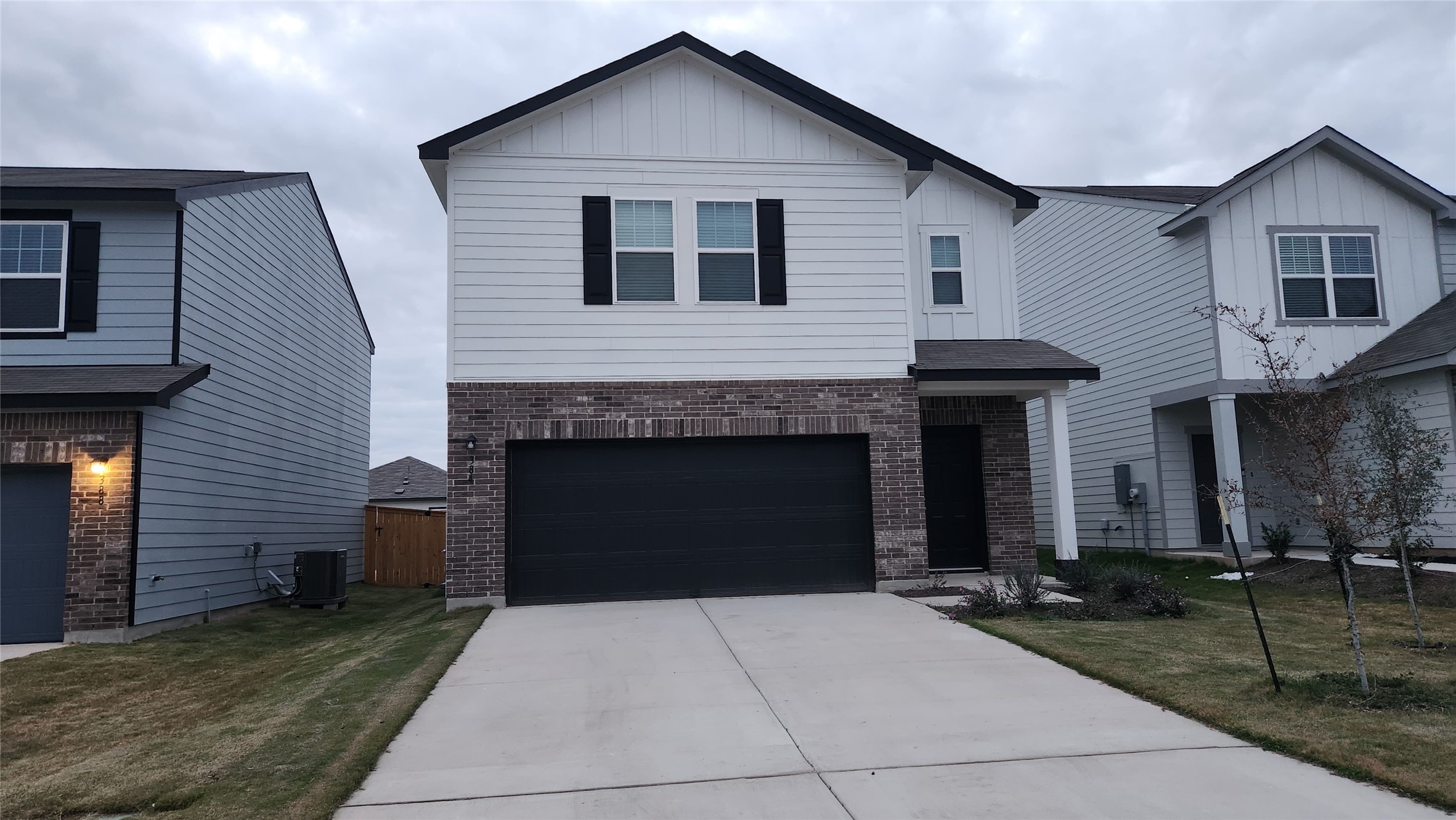 a front view of a house with yard