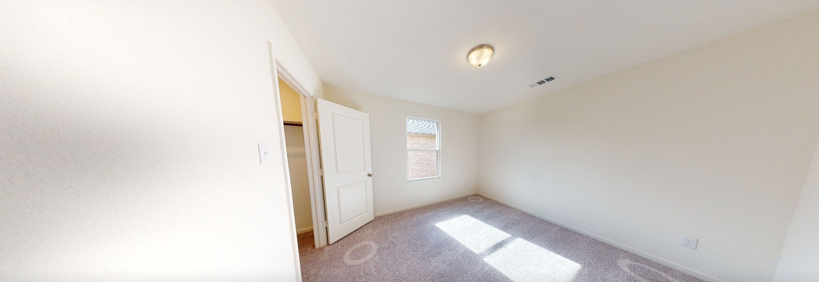 384 Enforcer Loop Jarrell, TX 76537 - Photo 13 of 15 Empty room featuring carpet floors and baseboards