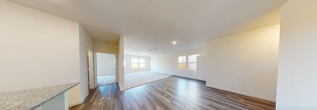 a bathroom with a double vanity sink and mirror