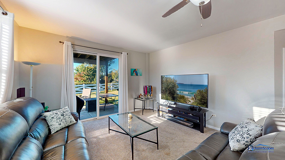 746 Legend Lane McHenry, IL 60050 - Photo 25 of 51 a living room with furniture and a flat screen tv
