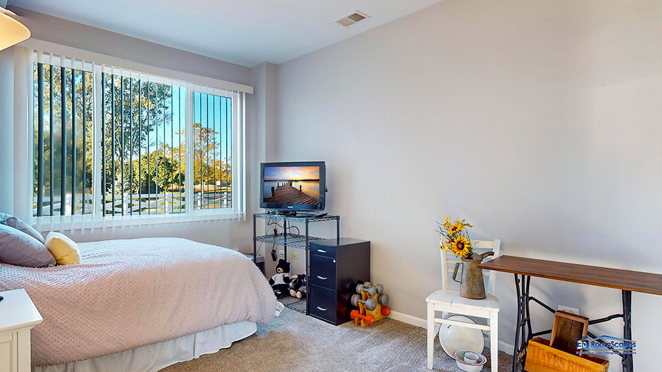 746 Legend Lane McHenry, IL 60050 - Photo 30 of 51 a bedroom with furniture and a flat screen tv