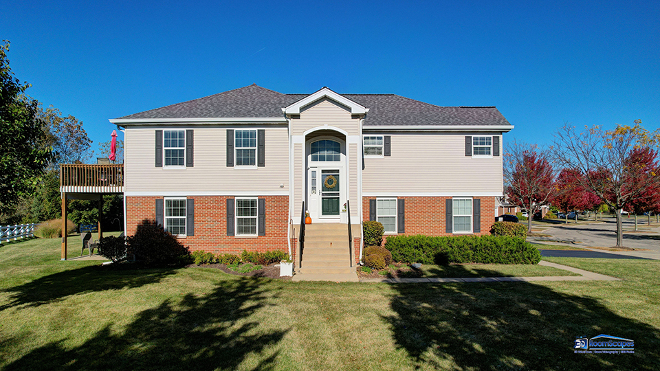 746 Legend Lane McHenry, IL 60050 - Photo 36 of 51 a front view of a house with a yard