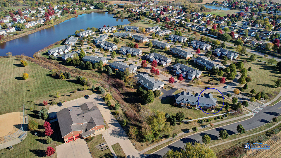 746 Legend Lane McHenry, IL 60050 - Photo 41 of 51 an aerial view of a residential apartment building with a garden