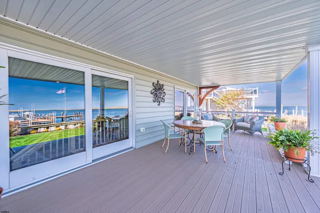 a kitchen with stainless steel appliances granite countertop a refrigerator sink and cabinets