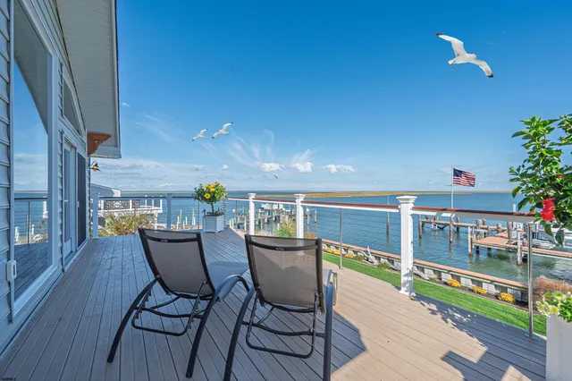 a bedroom with a bed and a mirror