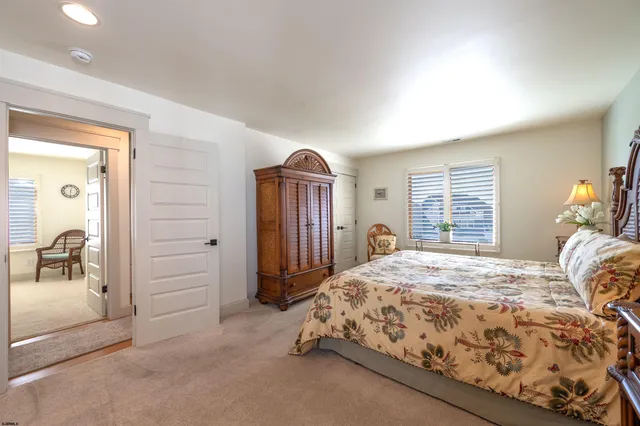 a view of house with backyard