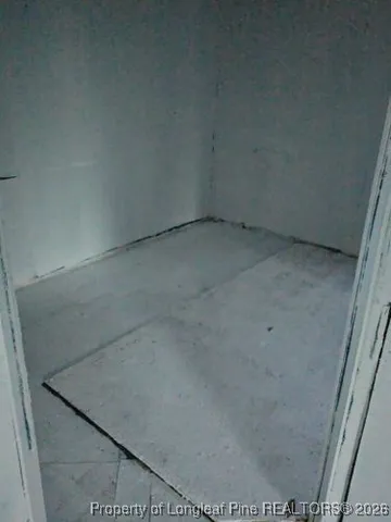 a view of a room that has a window in it