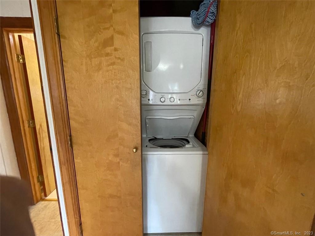 68 Kelsey Place Madison, CT 06443 - Photo 13 of 18 a utility room with dryer and washer