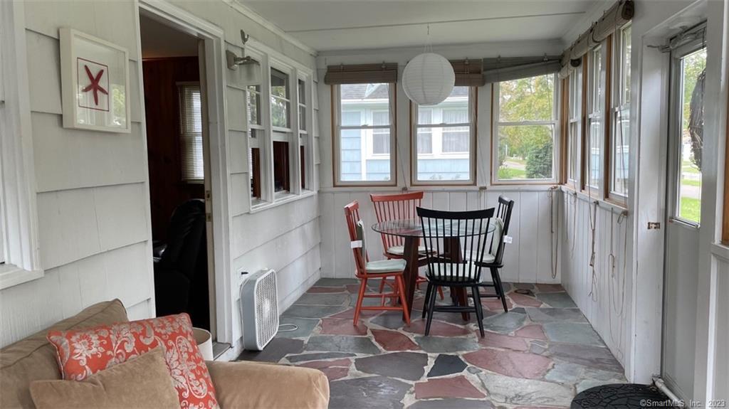 68 Kelsey Place Madison, CT 06443 - Photo 15 of 18 a dining room with furniture and window