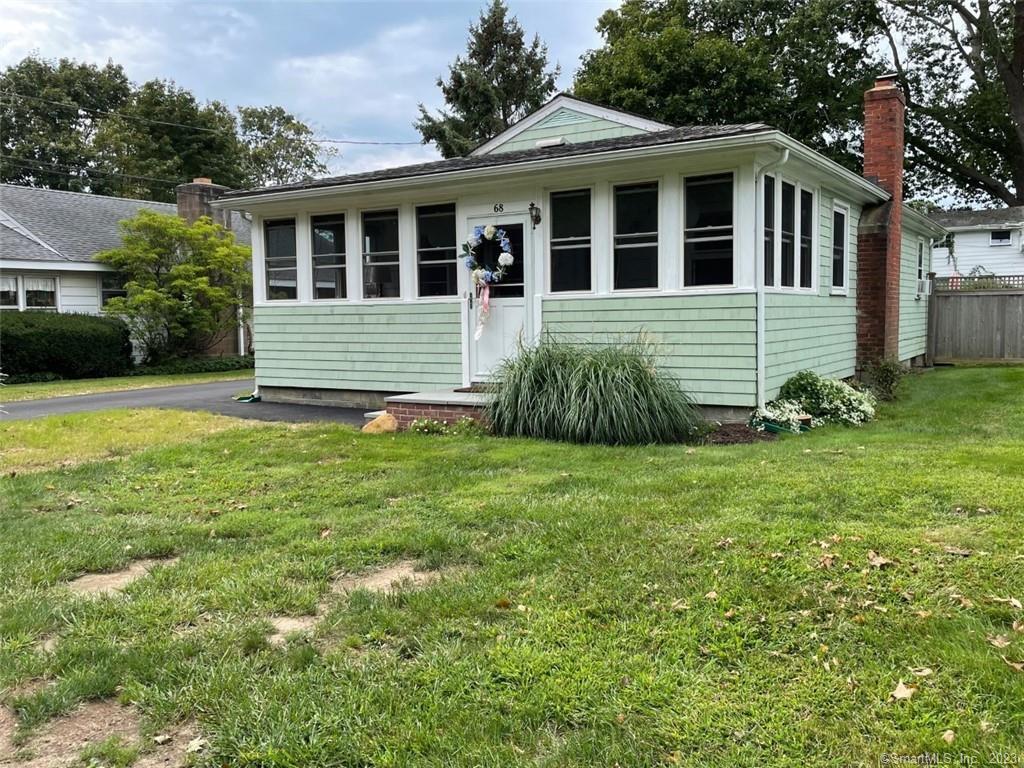 68 Kelsey Place Madison, CT 06443 - Photo 2 of 18 a view of a house with a yard