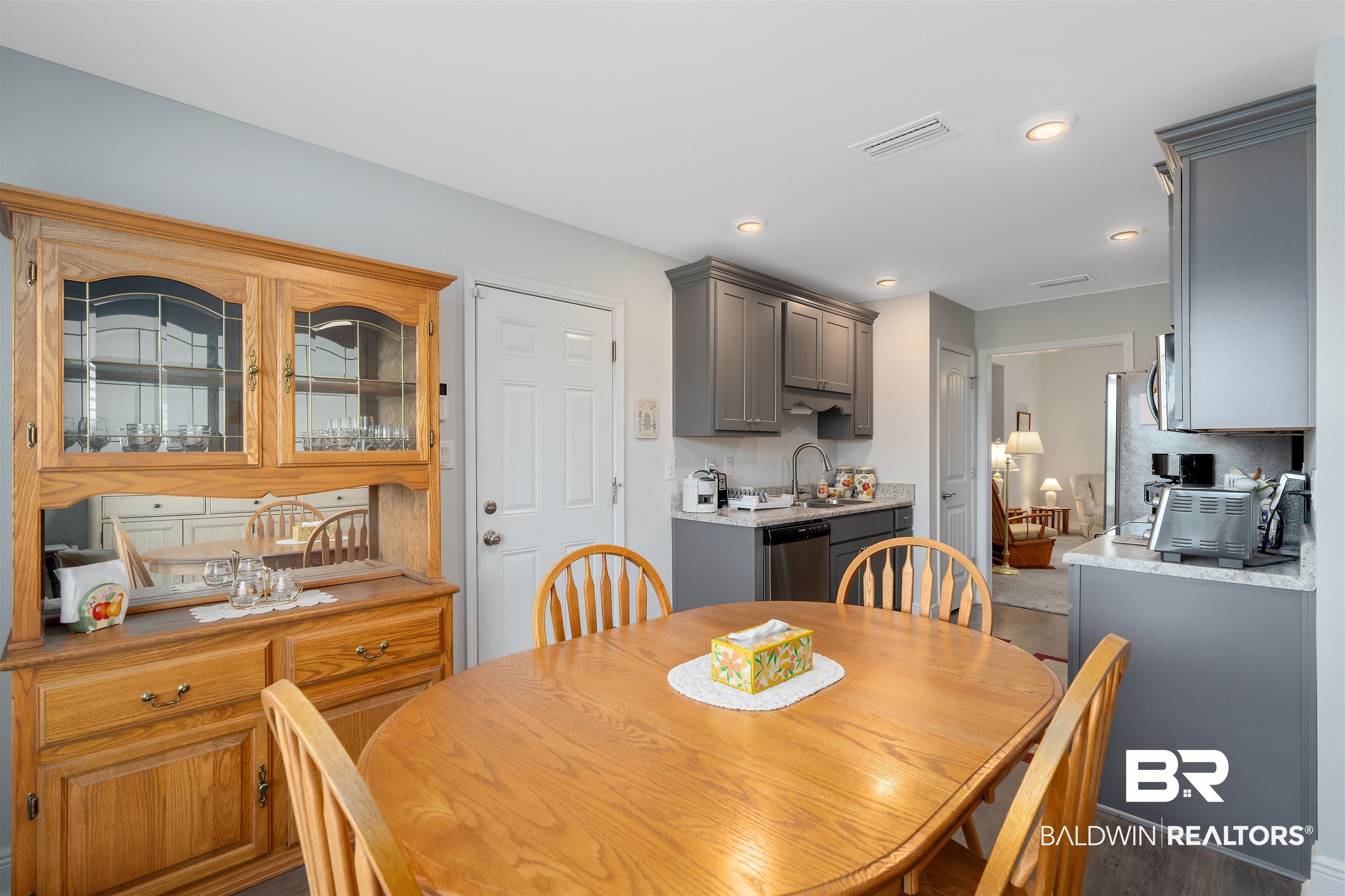8823 Allay Lane Foley, AL 36535 - Photo 4 of 18 Dining room featuring sink and hardwood / wood-style flooring