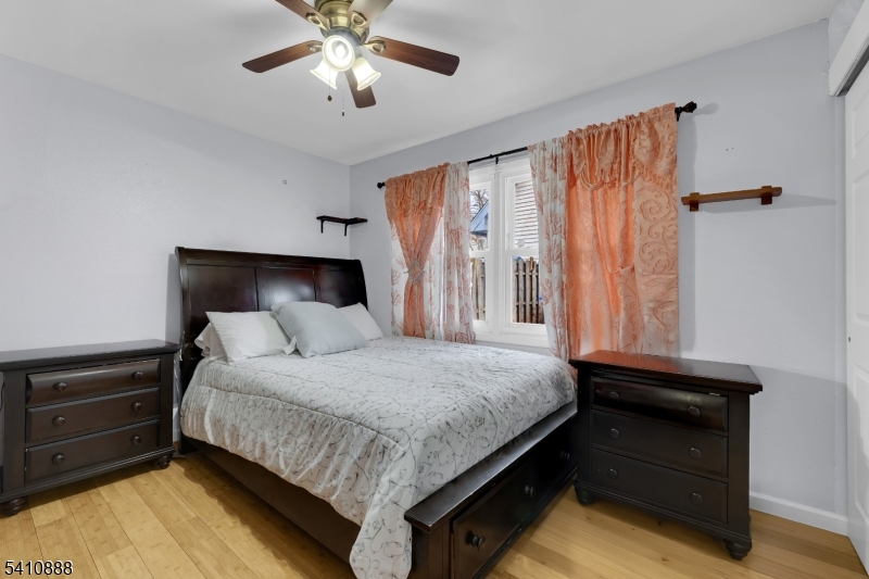 30 General Lane Willingboro, NJ 08046 - Photo 20 of 22 a bedroom with a bed and a ceiling fan