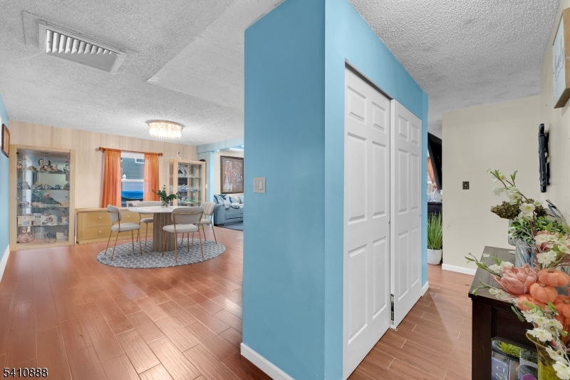 30 General Lane Willingboro, NJ 08046 - Photo 5 of 22 a view of a living room and a dining room with chandelier