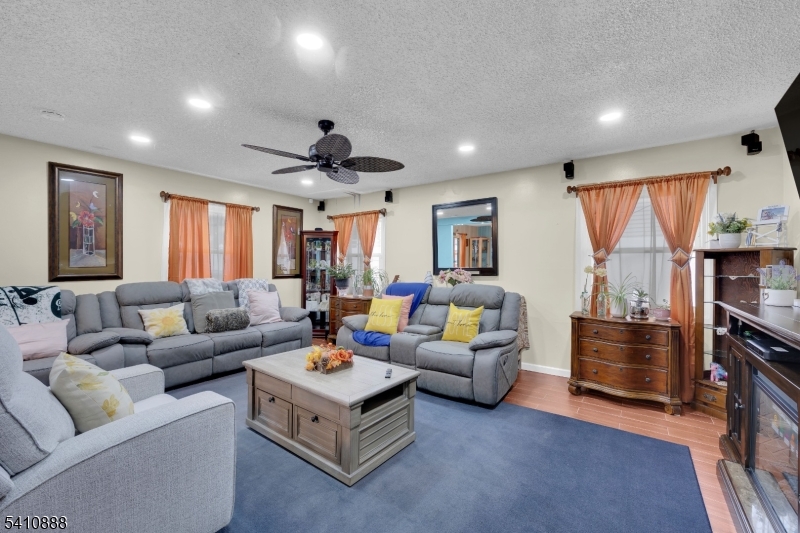 30 General Lane Willingboro, NJ 08046 - Photo 10 of 22 a living room with furniture and a flat screen tv
