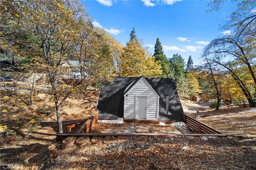 180 Glen Avon Drive Cedar Glen, CA 92321 - Photo 19 of 24 a front view of a house with a yard