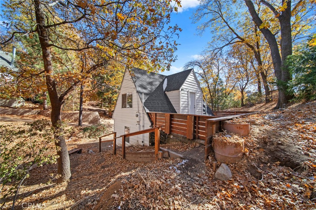 180 Glen Avon Drive Cedar Glen, CA 92321 - Photo 20 of 24 a view of a bench in a backyard