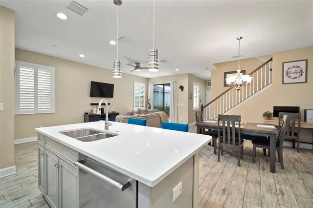 a very nice looking dining room with a table and chairs