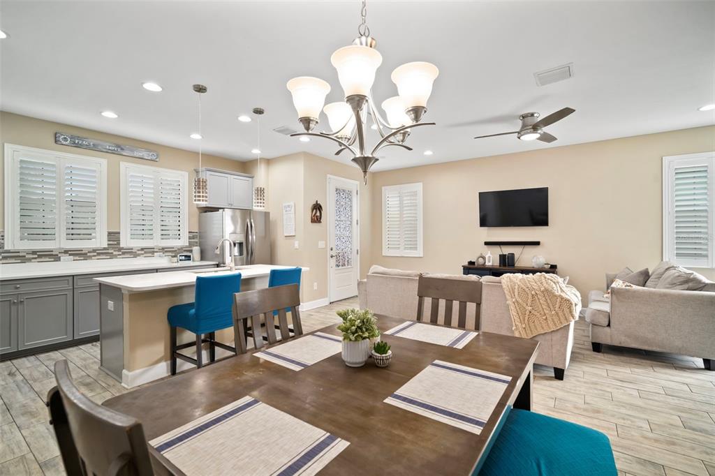 5807 Circa Fishhawk Boulevard Lithia, FL 33547 - Photo 8 of 40 a living room with fireplace furniture and a flat screen tv