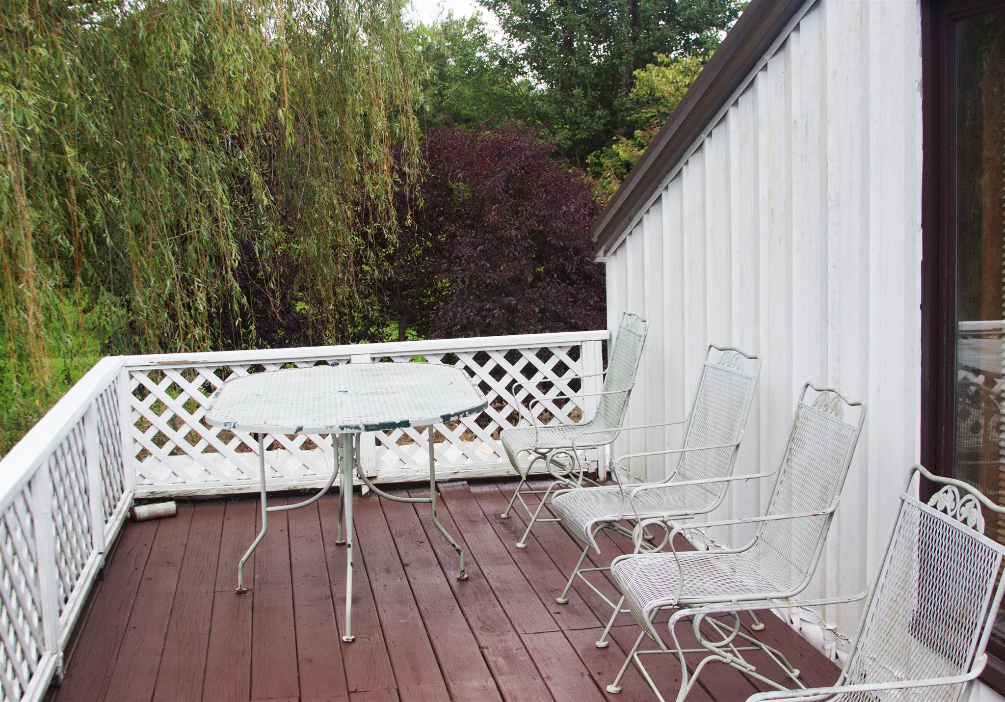 3932 Pleasant Grove Road White House, TN 37188 - Photo 12 of 14 a view of balcony with wooden floor and outdoor seating