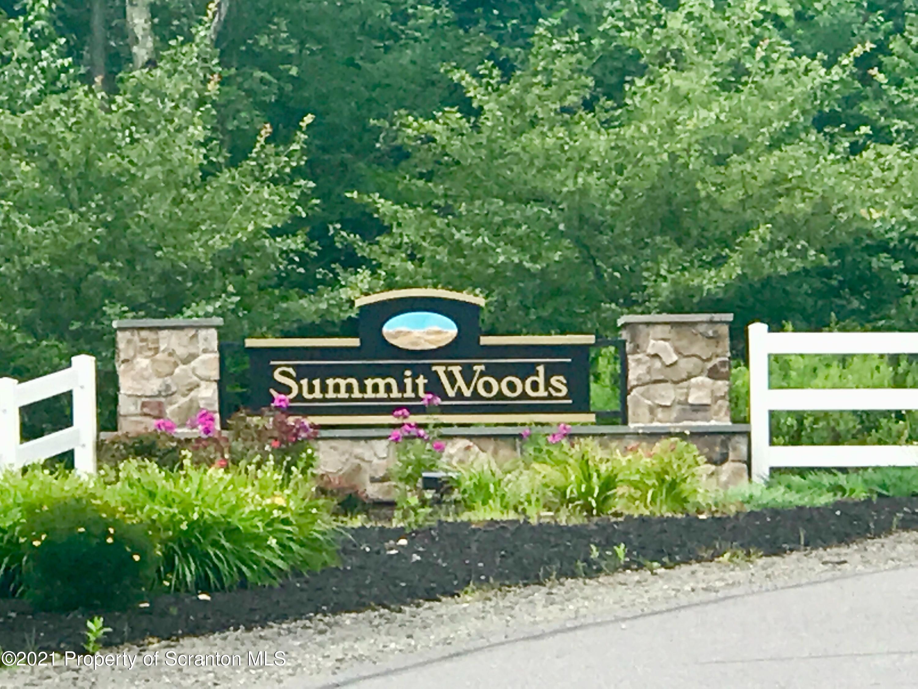 Lot 170 Summit Woods Road Moscow, PA 18444 - Photo 2 of 3 a sign that is on a pole