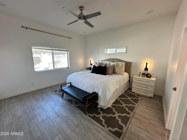 a kitchen with stainless steel appliances granite countertop a sink a stove and cabinets