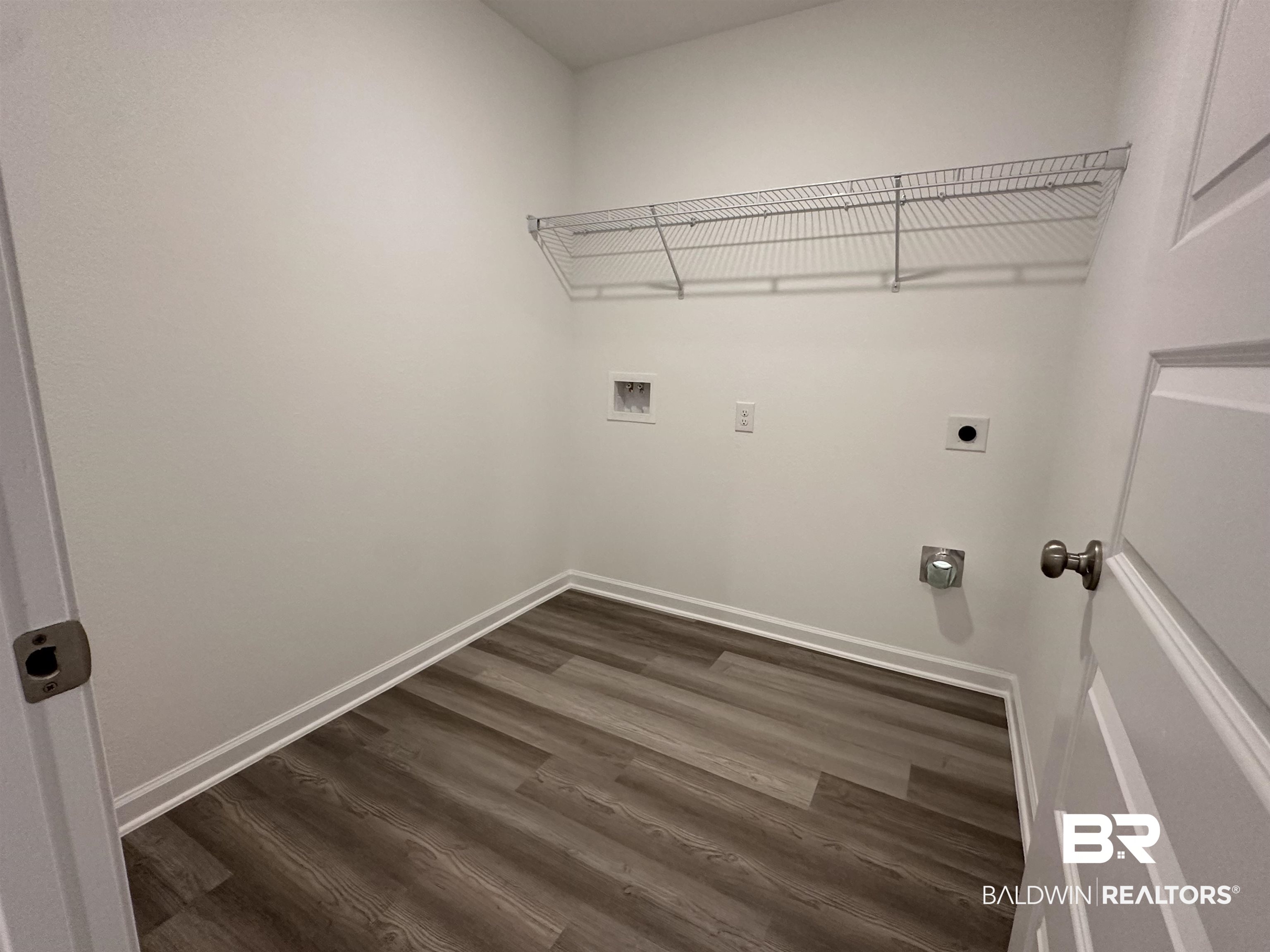 22275 Aleutian Avenue Foley, AL 36535 - Photo 20 of 72 Clothes washing area featuring electric dryer hookup, dark hardwood / wood-style floors, and washer hookup