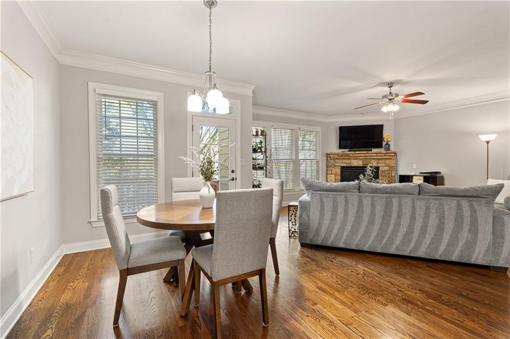 2015 Eagle Ridge Roswell, GA 30076 - Photo 13 of 47 a view of a dining room with furniture window and wooden floor