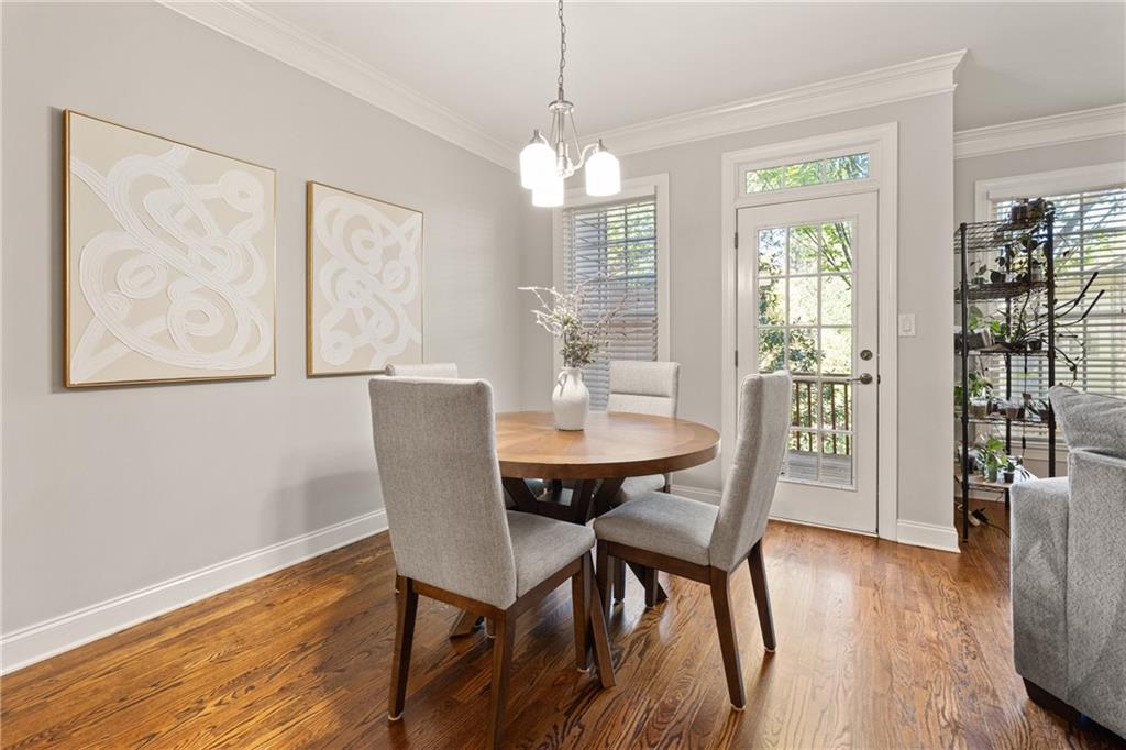 2015 Eagle Ridge Roswell, GA 30076 - Photo 15 of 47 a view of a dining room with furniture window and wooden floor