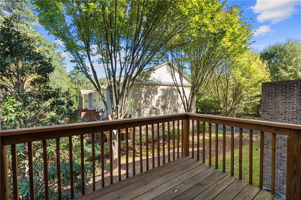 2015 Eagle Ridge Roswell, GA 30076 - Photo 17 of 47 a view of balcony with wooden floor and fence