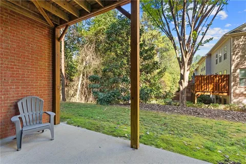 a view of backyard with green space