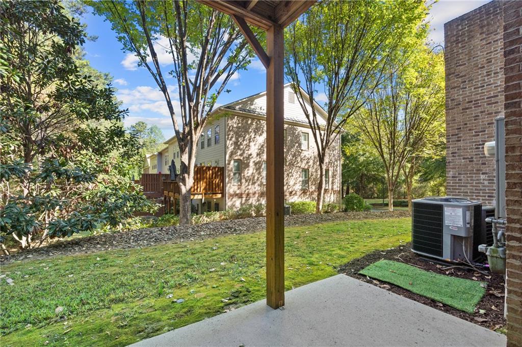 2015 Eagle Ridge Roswell, GA 30076 - Photo 36 of 47 a view of a backyard with large trees